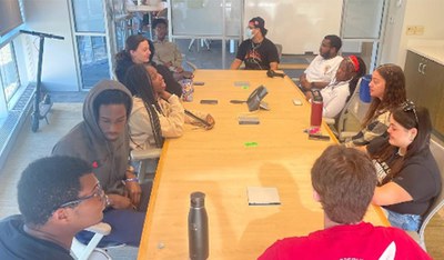 Photos for newsletterEWD 12.jpg REM students attend a Check-in meeting with graduate assistants.