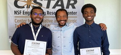 Photos for newsletterEWD 16.jpg Michael Roberts from Tuskegee University and Keylin Boyd from Texas Christian University with Professor Cornelius Masuku.
